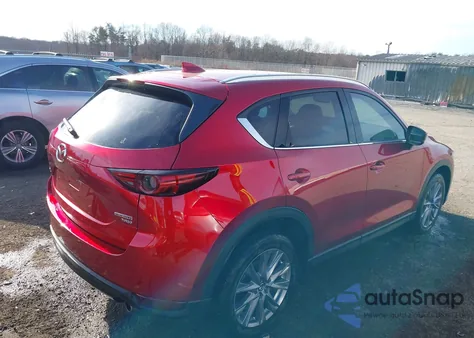 2021 Mazda Cx-5 Grand Touring Reserve z USA, uszkodzony, nr VIN JM3KFBAY5M0306115